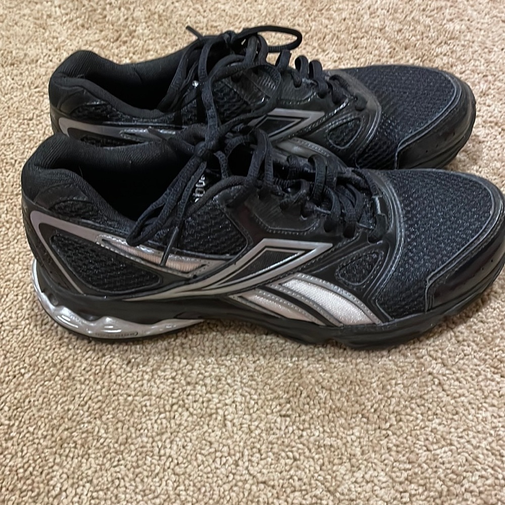 Black Reebox mens shoes with silver accents